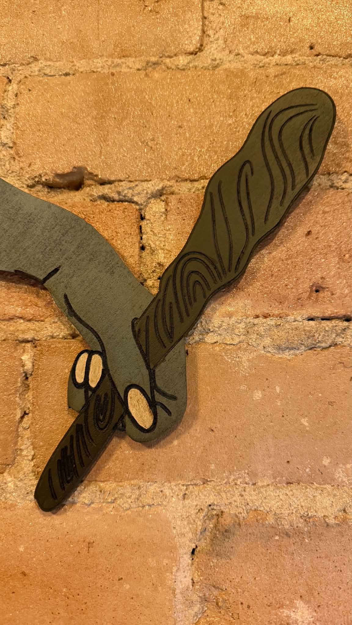 Mountain Troll Wooden Sign with Winging Legs