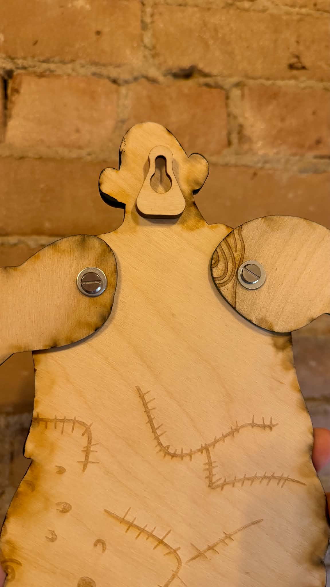 Mountain Troll Wooden Sign with Winging Legs