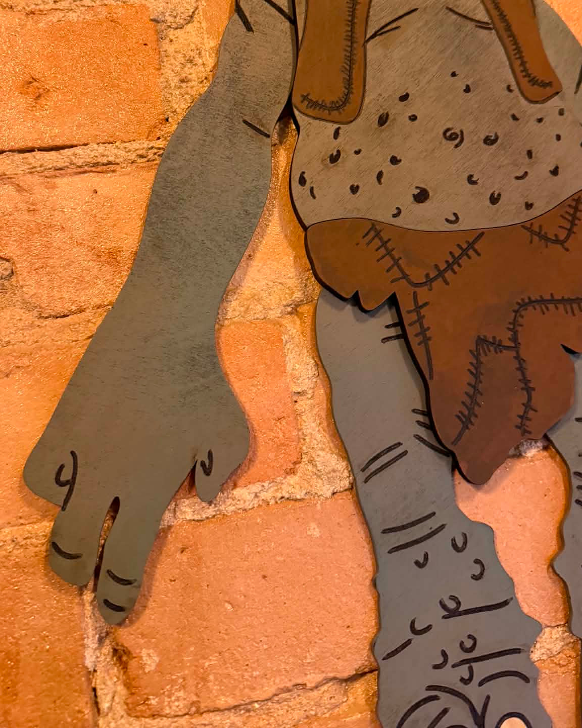 Mountain Troll Wooden Sign with Winging Legs